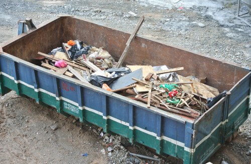 Demolition site with waste materials being sorted