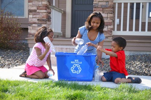 Workers separating recyclables for reuse in Bromley